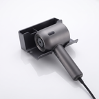 Wall-mounted hair dryer holder shown holding a hair dryer, elevated angle