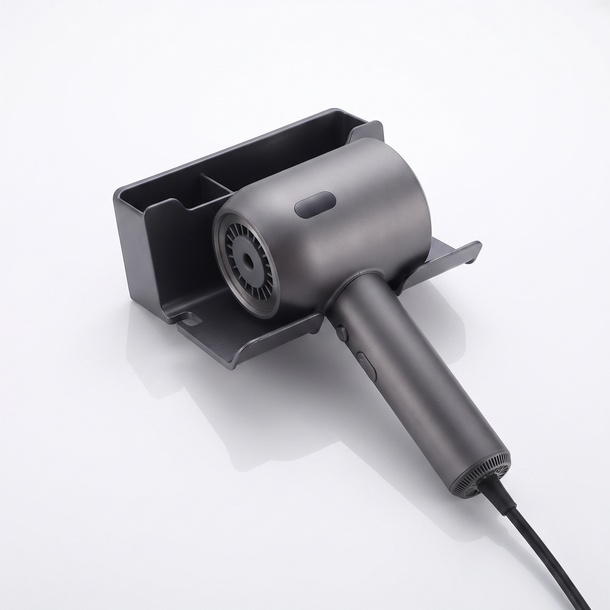 Wall-mounted hair dryer holder shown holding a hair dryer, elevated angle