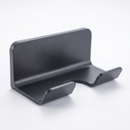 Wall-mounted hair dryer holder, white studio background, front three-quarter view